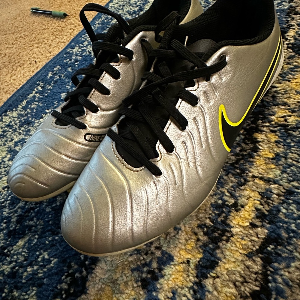 Nike Metallic Silver Cleats with Black and Yellow Details